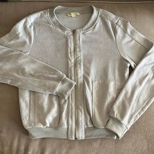 ALYTHEA faux suede laser cut bomber jacket